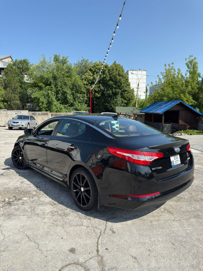 KIA Optima an. 2013 photo 2